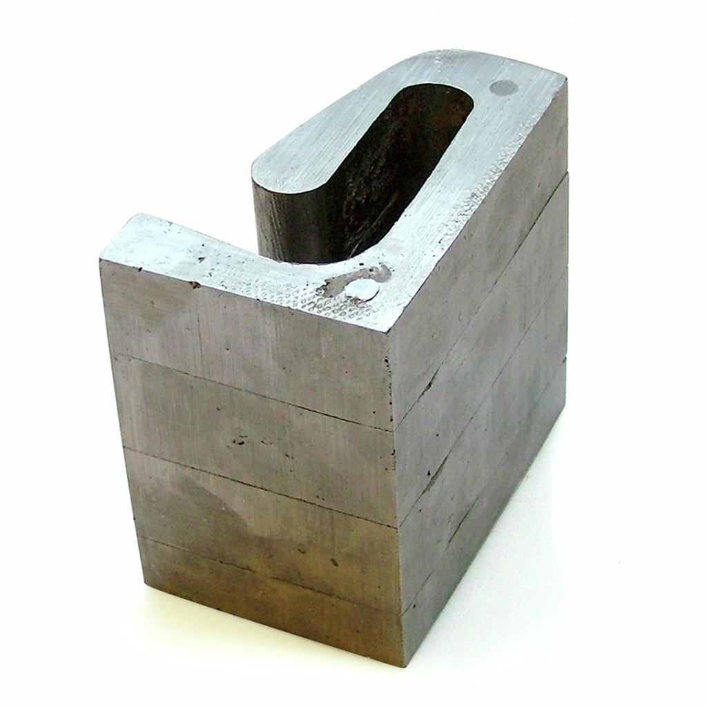 A metal fist to bang on the table for the moments when you've got the feeling that something has to stop right now! ( tin, h:10 w:15 d:10 cm )